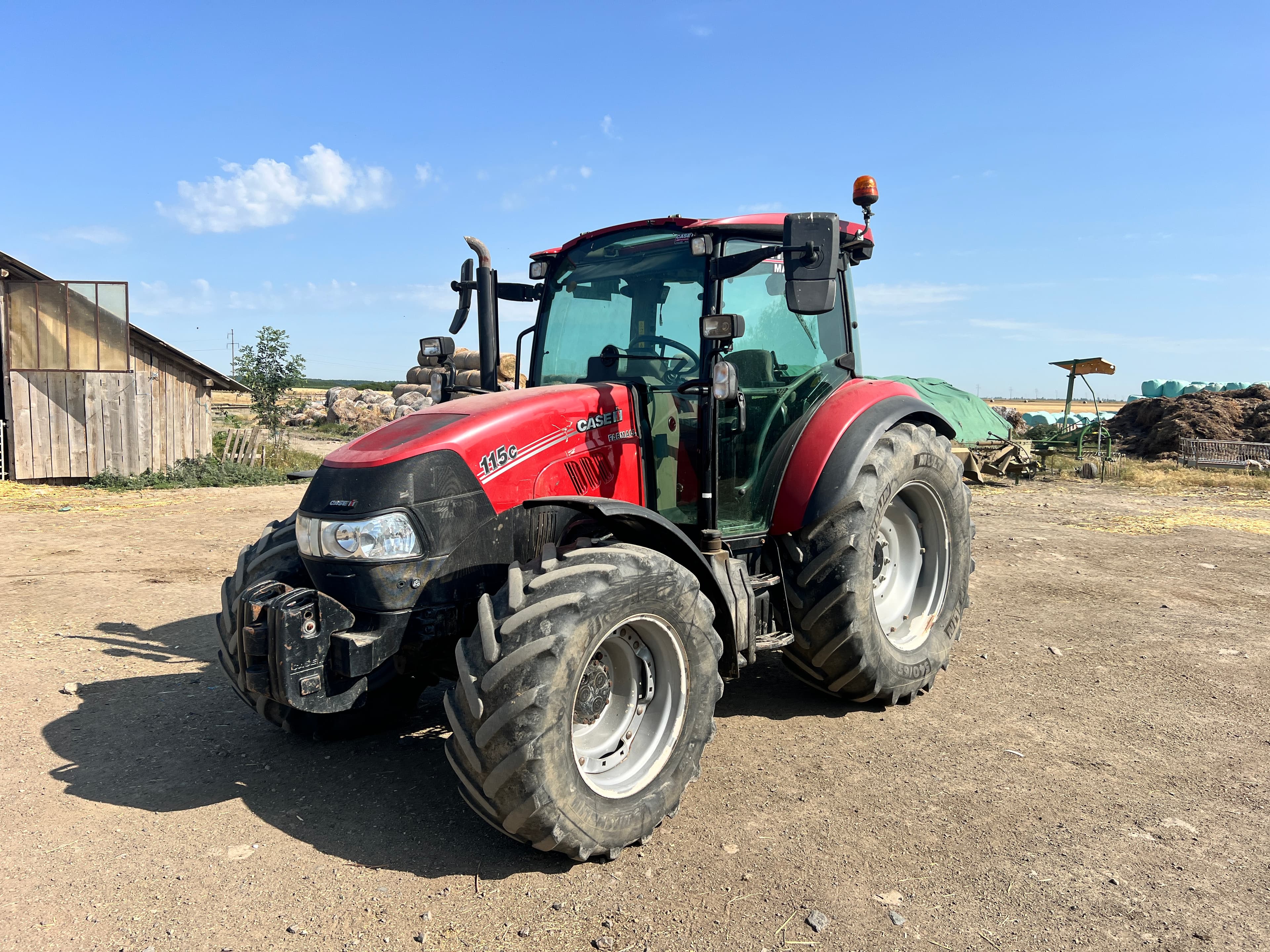 Vând Case FARMALL 115 C